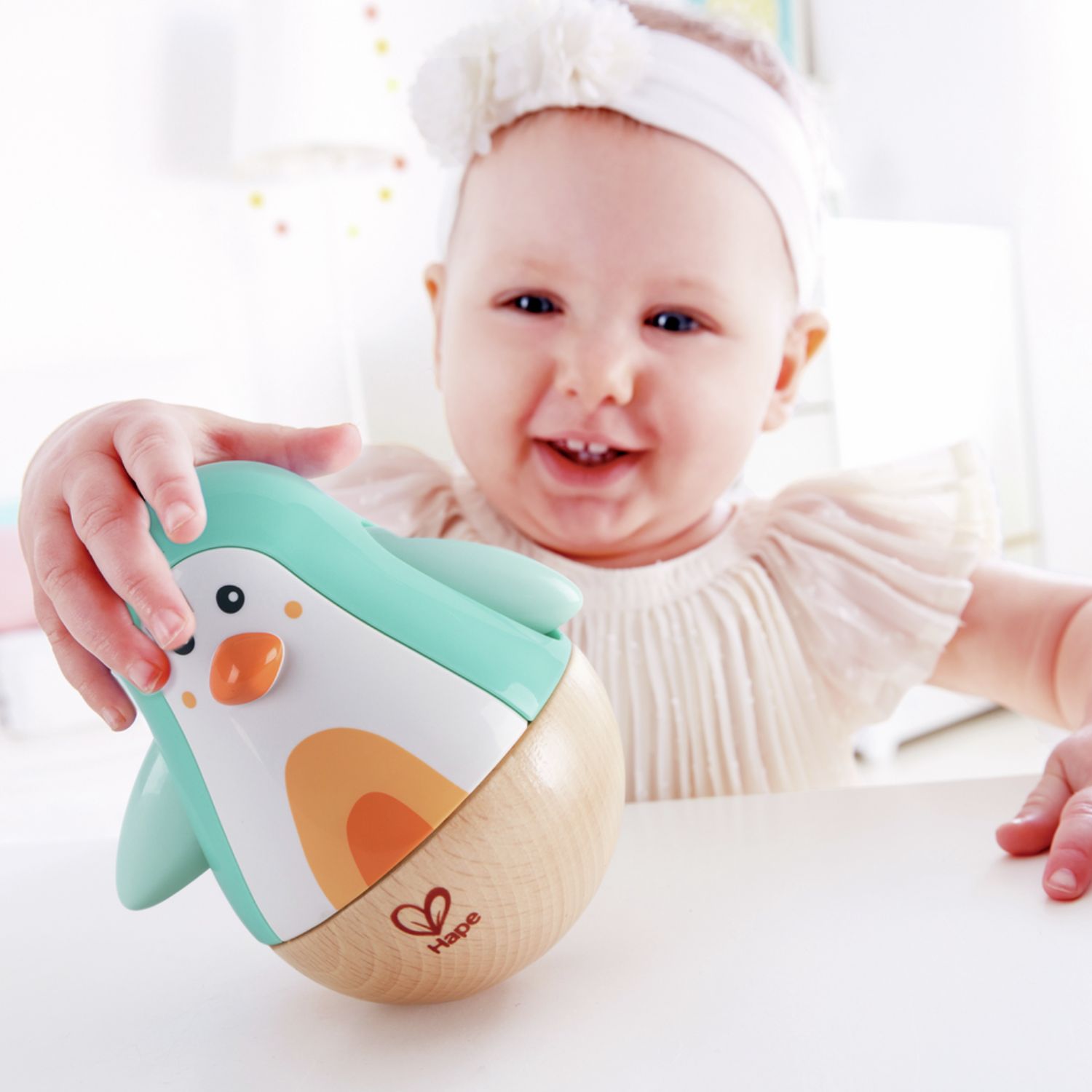 Hape - Pingouin culbuto Turquoise