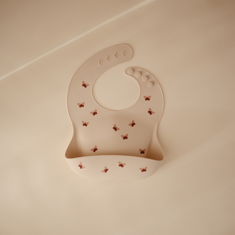 Bavoir à poche en silicone Butterflies (Mushie) - Image 3