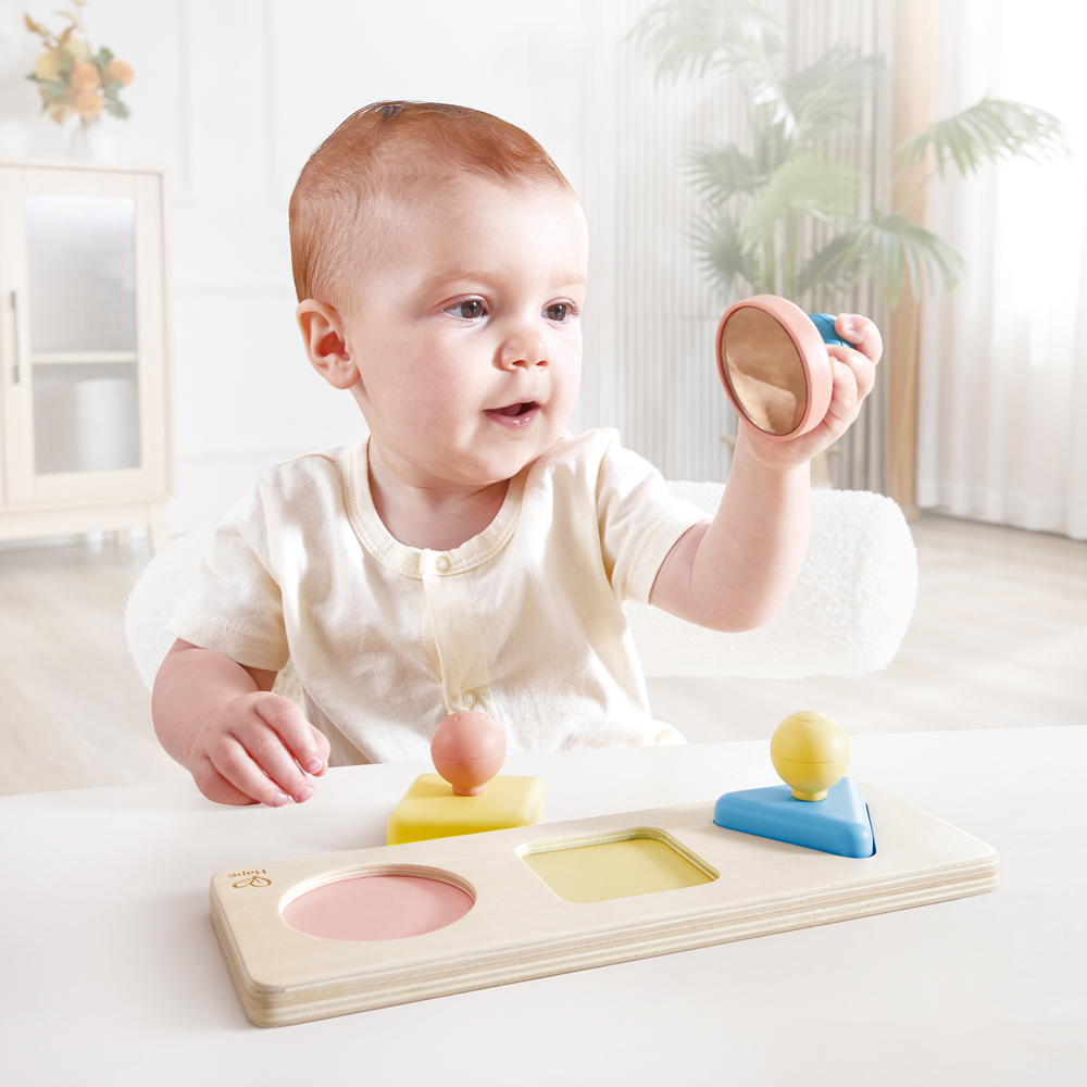 Puzzle trieur de formes Montessori en riz (Hape) - Image 1