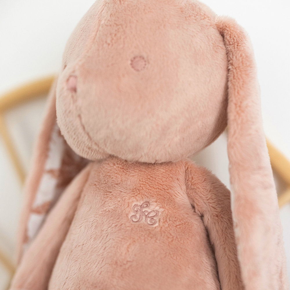 Peluche Augustin le lapin rose (25 cm)