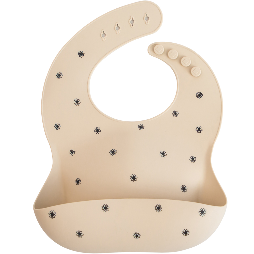 Bavoir à poche en silicone Black daisy (Mushie) - Image 1